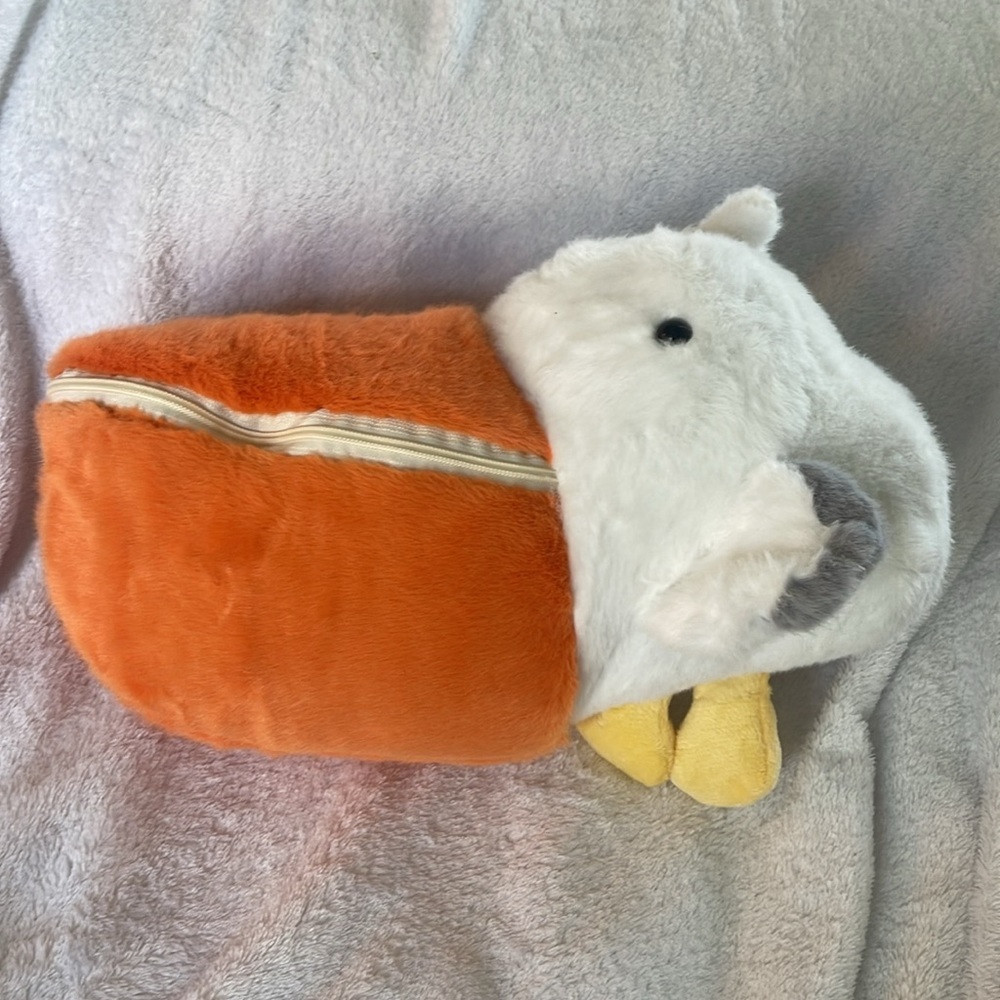 Plush pelican reversible to Brown Capybara Toy. NWOT
